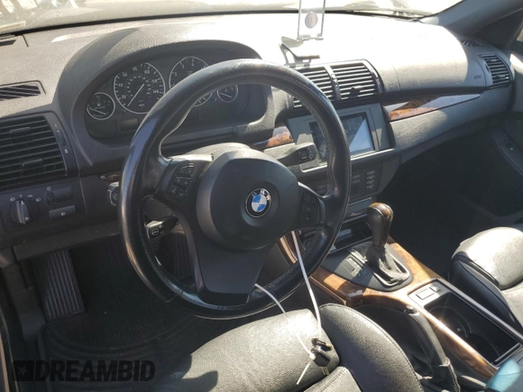 2006 BMW X5 4.4i with VIN 5UXFB53576LV24809, listed as a Copart auction lot 71479414 with 107,792 mi miles and Salvage Title. Bid and sale history available at carsss.com. Image 8.