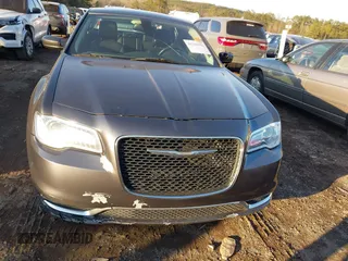 2016 Chrysler 300 Limited with VIN 2C3CCAAG5GH151450, listed as a IAAI auction lot 41253553 with 146,669 mi miles. Bid and sale history available at carsss.com. Image 17.