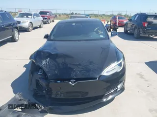 2020 Tesla Model S Long Range with VIN 5YJSA1E27LF397346, listed as a IAAI auction lot 40579015 with 43,779 mi miles and . Bid and sale history available at DreamBid. Image 12.
