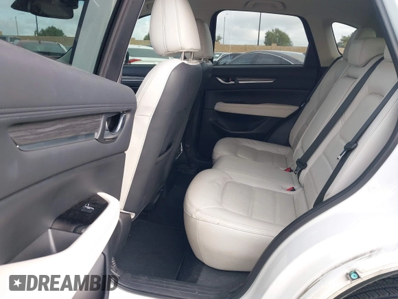 2018 Mazda CX-5 Grand Touring with VIN JM3KFADMXJ0470846, listed as a IAAI auction lot 41913533 with 54,700 mi miles and . Bid and sale history available at DreamBid. Image 8.