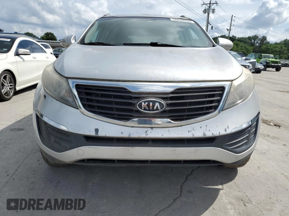 2011 Kia Sportage LX z VIN KNDPB3A24B7050422, wystawiony jako Copart lot #58639255 z przebiegiem 179 160 mil mil oraz Czysty tytuł • Clean title. Historia ofert i sprzedaży dostępna na DreamBid. Obrazek 5.
