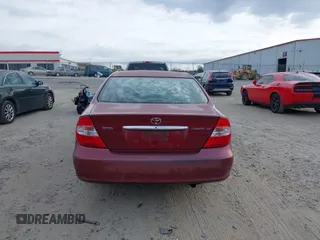 2002 Toyota Camry LE z VIN 4T1BE32K82U005531, wystawiony jako IAAI lot #41650283 z przebiegiem 328 259 mil mil oraz . Historia ofert i sprzedaży dostępna na DreamBid. Obrazek 17.