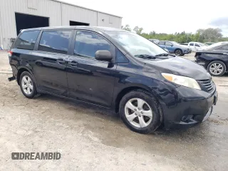 2014 Toyota Sienna L with VIN 5TDZK3DC3ES514520, listed as a Copart auction lot 52205295 with 71,402 mi miles and Salvage Title. Bid and sale history available at carsss.com. Image 4.