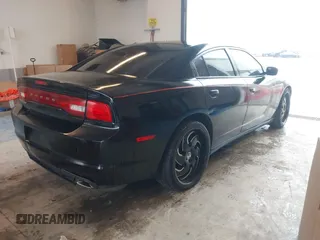 2012 Dodge Charger Police with VIN 2C3CDXAG3CH305132, listed as a IAAI auction lot 41555619 with 128,777 mi miles. Bid and sale history available at carsss.com. Image 4.