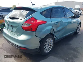 2012 Ford Focus SE with VIN 1FAHP3K24CL394495, listed as a IAAI auction lot 42034167 with 66,833 mi miles and . Bid and sale history available at carsss.com. Image 4.