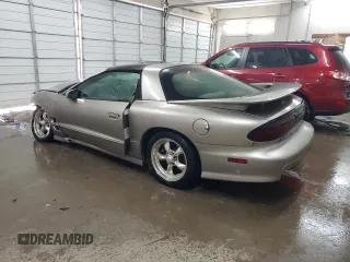 2002 Pontiac Firebird Formula z VIN 2G2FV22G222107252, wystawiony jako Copart lot #68626414 z przebiegiem 195 430 mil mil oraz Szkody całkowita. Historia ofert i sprzedaży dostępna na DreamBid. Obrazek 2.