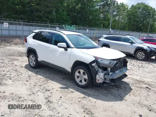 2021 Toyota RAV4 XLE with VIN 2T3W1RFV0MW114998, listed as a IAAI auction lot 42377866 with 101,922 mi miles and . Bid and sale history available at DreamBid. Image 1.