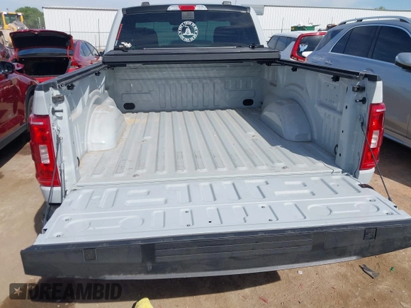 2023 Ford F-150 XL with VIN 1FTMF1C53PKF34184, listed as a IAAI auction lot 42242703 with 27,312 mi miles and . Bid and sale history available at DreamBid. Image 18.