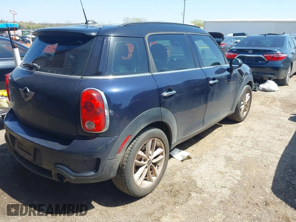 2014 MINI Countryman S with VIN WMWZC3C5XEWP27221, listed as a IAAI auction lot 41957817 with 112,353 mi miles and . Bid and sale history available at DreamBid. Image 4.