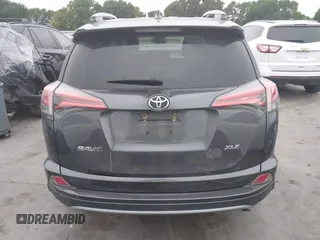 2018 Toyota RAV4 XLE with VIN 2T3WFREV1JW512476, listed as a IAAI auction lot 42177733 with 132,207 mi miles and . Bid and sale history available at DreamBid. Image 16.