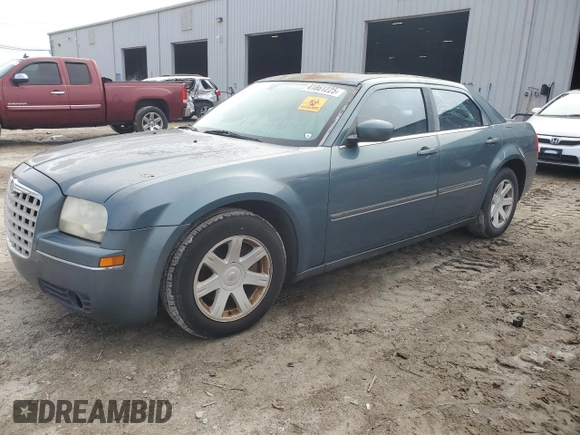 2005 Chrysler 300 with VIN 2C3JA53G65H651700, listed as a Copart auction lot 41861225 with 247,771 mi miles and Salvage Title. Bid and sale history available at carsss.com. Image 1.