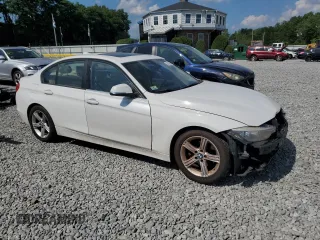 2013 BMW 3 Series 328i xDrive with VIN WBA3B3C52DF538960, listed as a Copart auction lot 63793665 with 161,782 mi miles and Clean title. Bid and sale history available at DreamBid. Image 4.