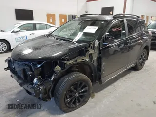 2018 Toyota RAV4 XLE with VIN 2T3RFREV0JW715761, listed as a IAAI auction lot 41881863 with 67,534 mi miles and . Bid and sale history available at DreamBid. Image 18.
