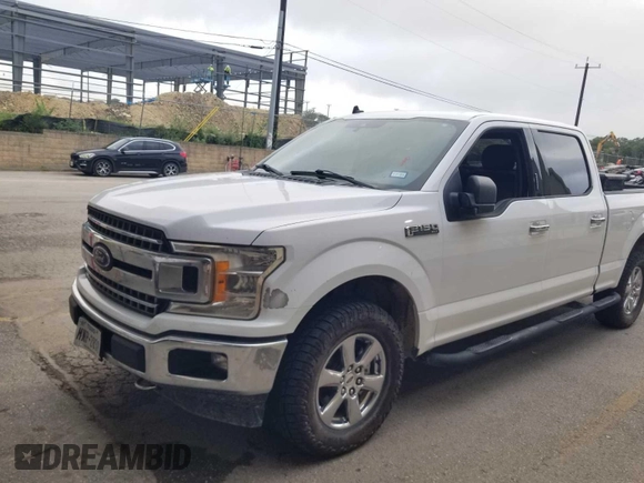 2019 Ford F-150 XL with VIN 1FTFW1E42KKF27037, listed as a IAAI auction lot 42777832 with 169,179 mi miles and . Bid and sale history available at DreamBid. Image 3.