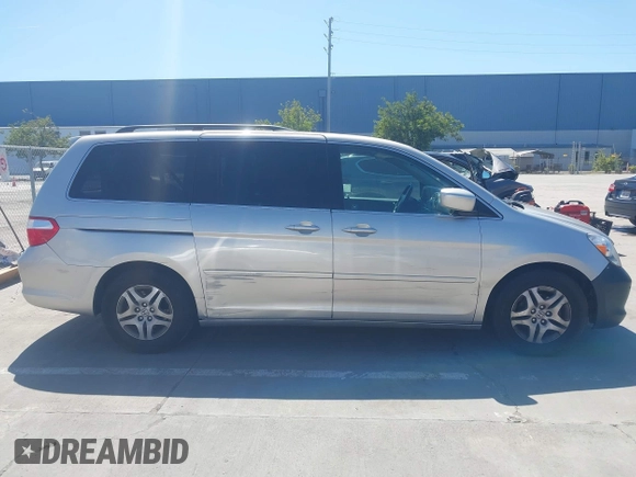 2006 Honda Odyssey EX-L with VIN 5FNRL38766B038599, listed as a IAAI auction lot 41989217 with 164,118 mi miles. Bid and sale history available at carsss.com. Image 14.
