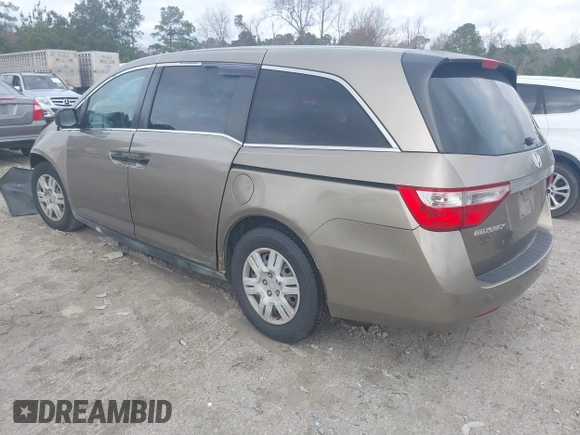 2012 Honda Odyssey LX z VIN 5FNRL5H25CB019912, wystawiony jako IAAI lot #41458224 z przebiegiem 158 980 mil mil oraz . Historia ofert i sprzedaży dostępna na DreamBid. Obrazek 3.