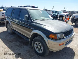 1998 Mitsubishi Montero LS z VIN JA4MT31P9WP005522, wystawiony jako IAAI lot #42047242 z przebiegiem Nie podano mil oraz . Historia ofert i sprzedaży dostępna na DreamBid. Obrazek 1.
