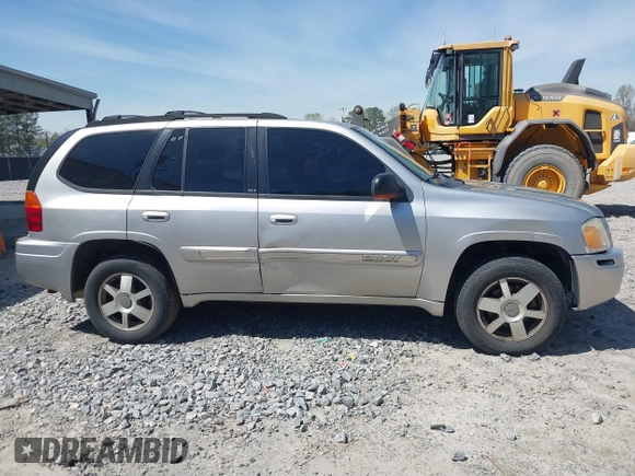 2005 GMC Envoy SLE with VIN 1GKDS13S652390259, listed as a IAAI auction lot 41825258 with 162,172 mi miles and . Bid and sale history available at DreamBid. Image 13.