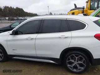 2016 BMW X1 xDrive28i with VIN WBXHT3C35GP881106, listed as a IAAI auction lot 41469920 with 161,110 mi miles. Bid and sale history available at carsss.com. Image 14.
