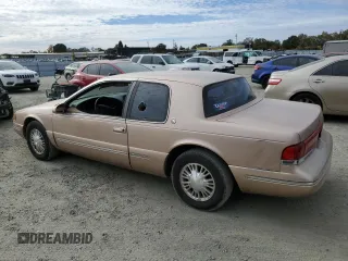 1996 Mercury Cougar z VIN 1MELM62W3TH600523, wystawiony jako Copart lot #78253454 z przebiegiem 84 531 mil mil oraz Tytuł czysty. Historia ofert i sprzedaży dostępna na DreamBid. Obrazek 2.
