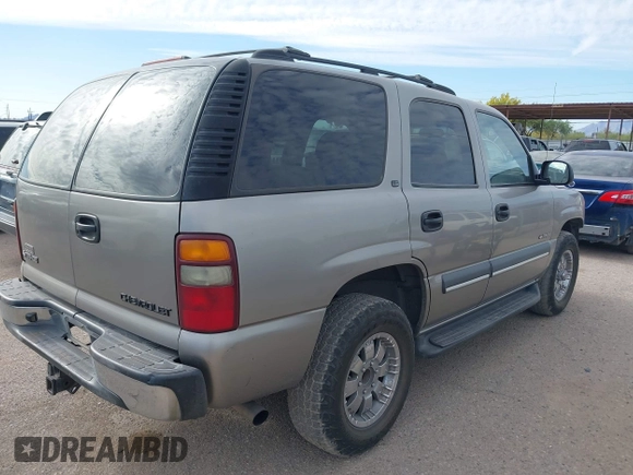 2002 Chevrolet Tahoe LS with VIN 1GNEC13V52R222517, listed as a IAAI auction lot 41994216 with 249,577 mi miles. Bid and sale history available at carsss.com. Image 4.
