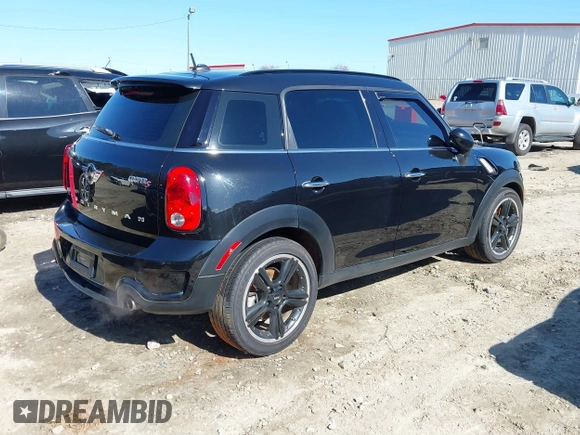 2015 MINI Countryman S with VIN WMWZC3C5XFWT04916, listed as a IAAI auction lot 41636369 with 101,448 mi miles and . Bid and sale history available at DreamBid. Image 4.