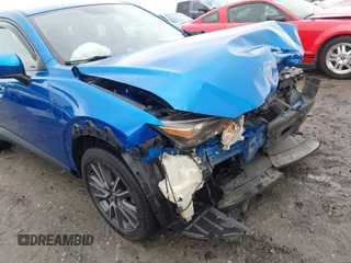 2017 Mazda CX-3 Touring z VIN JM1DKFC7XH0171860, wystawiony jako IAAI lot #42249818 z przebiegiem 54 873 mil mil oraz . Historia ofert i sprzedaży dostępna na DreamBid. Obrazek 18.