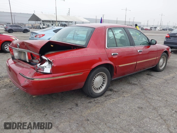 2000 Mercury Grand Marquis LS z VIN 2MEFM75W0YX658319, wystawiony jako IAAI lot #42028736 z przebiegiem 154 651 mil mil oraz . Historia ofert i sprzedaży dostępna na DreamBid. Obrazek 4.