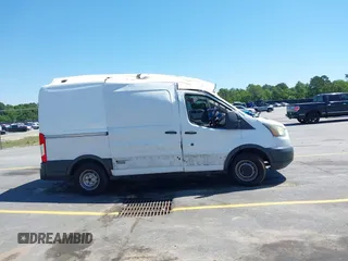 2017 Ford Transit Cargo z VIN 1FTYE1CM2HKB56212, wystawiony jako IAAI lot #42102063 z przebiegiem 174 769 mil mil oraz . Historia ofert i sprzedaży dostępna na DreamBid. Obrazek 13.