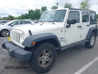 2008 Jeep Wrangler Unlimited X z VIN 1J4GA39188L584256, wystawiony jako IAAI lot #42349536 z przebiegiem 126 778 mil mil oraz . Historia ofert i sprzedaży dostępna na DreamBid. Obrazek 2.