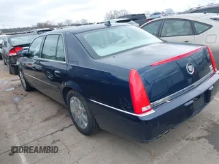 2009 Cadillac DTS 1SA z VIN 1G6KD57Y19U137656, wystawiony jako IAAI lot #41531439 z przebiegiem 103 151 mil mil oraz . Historia ofert i sprzedaży dostępna na DreamBid. Obrazek 3.