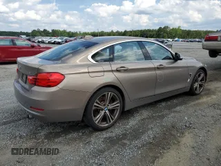 2017 BMW 4 Series 440i xDrive with VIN WBA4E5C52HG189371, listed as a Copart auction lot 56947674 with 101,331 mi miles and Salvage Title. Bid and sale history available at carsss.com. Image 3.