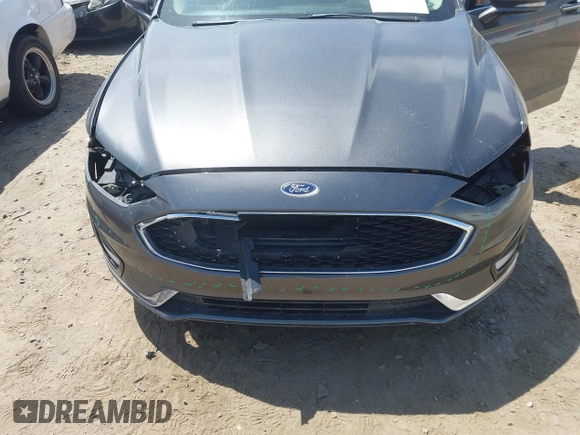 2019 Ford Fusion Titanium with VIN 3FA6P0D9XKR152617, listed as a IAAI auction lot 42209470 with 135,956 mi miles and . Bid and sale history available at DreamBid. Image 6.