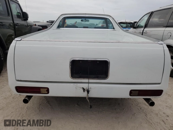 1984 Chevrolet El Camino z VIN 1GCCW80H7ER173291, wystawiony jako Copart lot #76606244 z przebiegiem Nie podano mil oraz Szkoda całkowita • Salvage title. Historia ofert i sprzedaży dostępna na DreamBid. Obrazek 6.