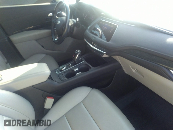2019 Cadillac XT4 FWD Premium Luxury with VIN 1GYFZCR41KF202167, listed as a IAAI auction lot 35653161 with 64,132 mi miles and . Bid and sale history available at DreamBid. Image 5.