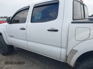 2013 Toyota Tacoma z VIN 5TFLU4EN2DX076815, wystawiony jako IAAI lot #41344839 z przebiegiem 311 083 mil mil oraz . Historia ofert i sprzedaży dostępna na DreamBid. Obrazek 14.