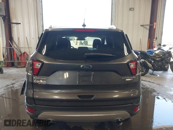 2019 Ford Escape Titanium with VIN 1FMCU9J97KUC55772, listed as a IAAI auction lot 42514001 with 77,737 mi miles and . Bid and sale history available at DreamBid. Image 17.