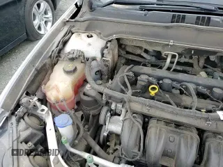 2017 Ford Fusion SE z VIN 3FA6P0H75HR137721, wystawiony jako Copart lot #84921715 z przebiegiem 128 975 mil mil oraz Szkoda całkowita • Salvage title. Historia ofert i sprzedaży dostępna na DreamBid. Obrazek 13.