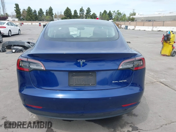 2021 Tesla Model 3 Long Range with VIN 5YJ3E1EB6MF878411, listed as a IAAI auction lot 41986947 with 71,978 mi miles and . Bid and sale history available at DreamBid. Image 17.