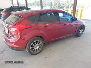 2014 Ford Focus SE with VIN 1FADP3K20EL325286, listed as a IAAI auction lot 42076013 with 119,271 mi miles. Bid and sale history available at carsss.com. Image 4.