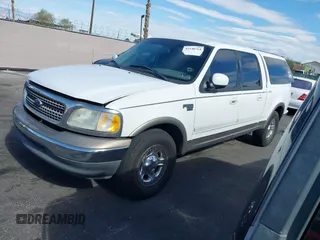 2003 Ford F-150 XLT with VIN 1FTRW07L23KA82084, listed as a IAAI auction lot 42140764 with 286,754 mi miles. Bid and sale history available at carsss.com. Image 2.