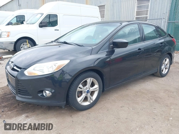 2012 Ford Focus SE with VIN 1FAHP3F25CL446064, listed as a IAAI auction lot 41883353 with 142,468 mi miles. Bid and sale history available at carsss.com. Image 2.