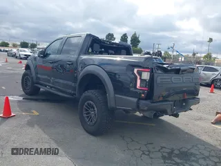 2020 Ford F-150 Raptor with VIN 1FTFW1RG2LFA30858, listed as a IAAI auction lot 41793692 with 90,018 mi miles and . Bid and sale history available at carsss.com. Image 3.