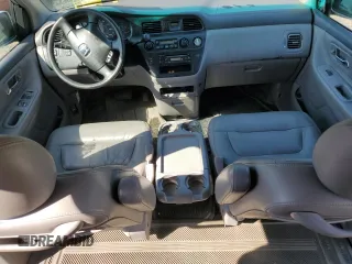 2003 Honda Odyssey EX-L z VIN 5FNRL18903B007639, wystawiony jako Copart lot #57230975 z przebiegiem 189 235 mil mil oraz Szkoda całkowita • Salvage title. Historia ofert i sprzedaży dostępna na DreamBid. Obrazek 8.