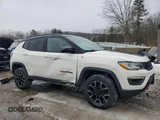 2019 Jeep Compass Trailhawk with VIN 3C4NJDDB0KT671292, listed as a Copart auction lot 46418675 with 175,494 mi miles and Salvage Title. Bid and sale history available at DreamBid. Image 4.