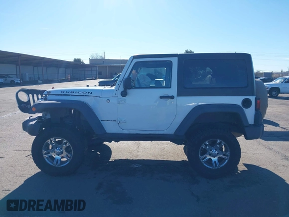 2011 Jeep Wrangler Rubicon with VIN 1J4HA6D17BL620734, listed as a IAAI auction lot 41219266 with 83,796 mi miles and . Bid and sale history available at carsss.com. Image 14.