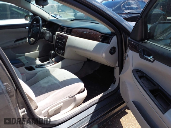 2014 Chevrolet Impala LT with VIN 2G1WB5E31E1106255, listed as a IAAI auction lot 41960424 with 235,070 mi miles and . Bid and sale history available at DreamBid. Image 5.