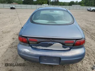 1999 Ford Taurus SE z VIN 1FAFP53U0XG322565, wystawiony jako Copart lot #54560285 z przebiegiem 164 300 mil mil oraz Szkoda całkowita • Salvage title. Historia ofert i sprzedaży dostępna na DreamBid. Obrazek 6.