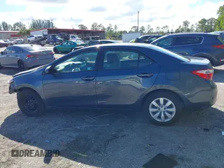 2016 Toyota Corolla L with VIN 5YFBURHE1GP478560, listed as a IAAI auction lot 41672034 with 154,221 mi miles and . Bid and sale history available at DreamBid. Image 14.