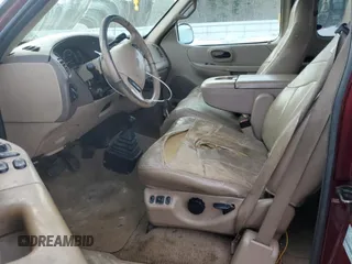 1999 Ford F-150 XL z VIN 2FTRX18L3XCA55634, wystawiony jako Copart lot #49896035 z przebiegiem 212 928 mil mil oraz Czysty tytuł • Clean title. Historia ofert i sprzedaży dostępna na DreamBid. Obrazek 7.